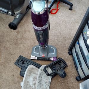 Bissell symphony all in one pet vacuum,  steam mop
